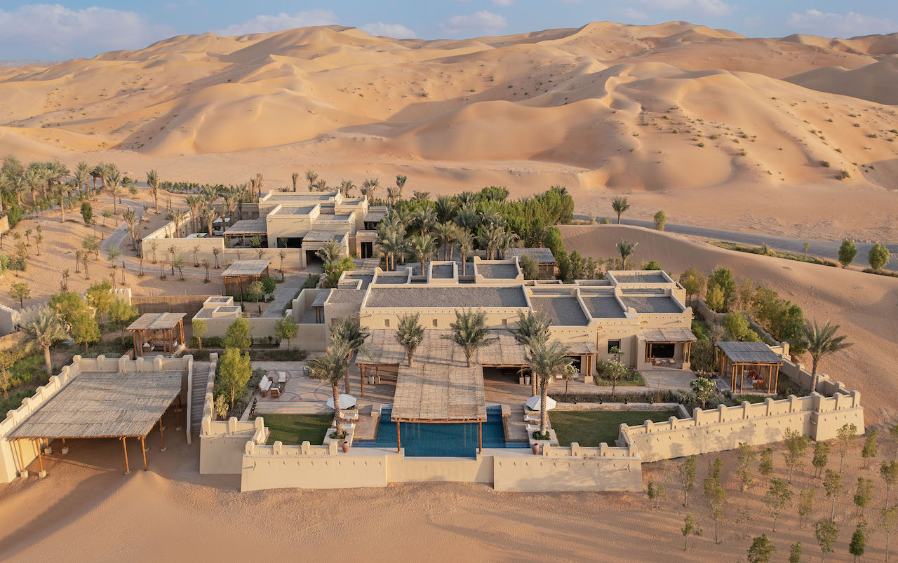 The desert oasis of Qasr Al Sarab Desert Resort by Anantara in the United Arab Emirates has unveiled the all-new four-bedroom Sahra Villa and two-bedroom Al Sarab Villa complete with its own private majlis. Located a few minutes drive from the resort in a secluded area offering unobstructed views of the fiery-red dunes of the Empty Quarter, both villas are part of the exclusive villa compound designed to offer utmost privacy and discrete service. The 489 sqm Sahra Villa is a palatial hideaway furnished in noble hues that can accommodate up to eight adults in its master bedroom and three twin bedrooms, each with its own private terrace. The villa also boasts a private swimming pool with a cabana and sprawling indoor and outdoor living spaces including a magnificent terrace inviting guests to stretch their eyes across the endless dunes. At the expansive and opulent 853 sqm Al Sarab Villa, guests are immersed in the natural beauty from the moment they step into the secluded sanctuary surrounded by palm trees. In addition to two elegant bedrooms accommodating a maximum of four guests, the lavish villa comes with ample space to entertain both indoors and outdoors, including a grand reception majlis and a fireplace to enjoy starry desert nights. On the outdoor terrace, a dining table sits alongside a fully equipped barbecue area, with sun loungers circling a private pool overlooking the dunes. Guests staying at Al Sarab Villa can also choose to book the private majlis (Arabic meeting and entertaining rooms) situated in a separate building close by, boasting floor-to-ceiling windows maximising the natural light. Warm and inviting, the space is designed for entertaining in true Emirati style amid contemporary Arabian design and artworks, with a team of butlers on hand to attend to every need. With a seating capacity of up to 20 guests indoors and an additional outdoor entertainment area, the sumptuously appointed majlis is ideal for private events and get-togethers. In addition to having access to all the comforts of the luxury accommodation, guests staying in villas belonging to Qasr Al Sarab Desert Resort by Anantara's Exclusive Villa Collection can enjoy 24/7 dedicated personal butler attention, private entrance with shaded parking, Apple TV, Nespresso machine, pillow and soap menus, and other exclusive amenities 