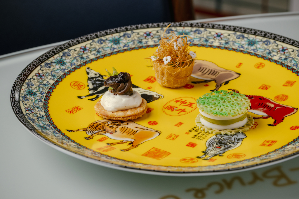 Embark on a gastronomic adventure as Hong Kong's two Michelin-starred Bo Innovation presents a whimsical 10-course “Arts of Asia” menu marking its 20th anniversary.