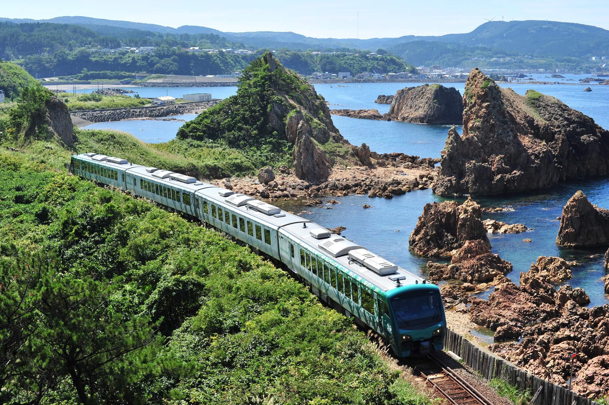 Embark on an unforgettable journey across Japan with the hybrid Resort Shirakami Buna train.
