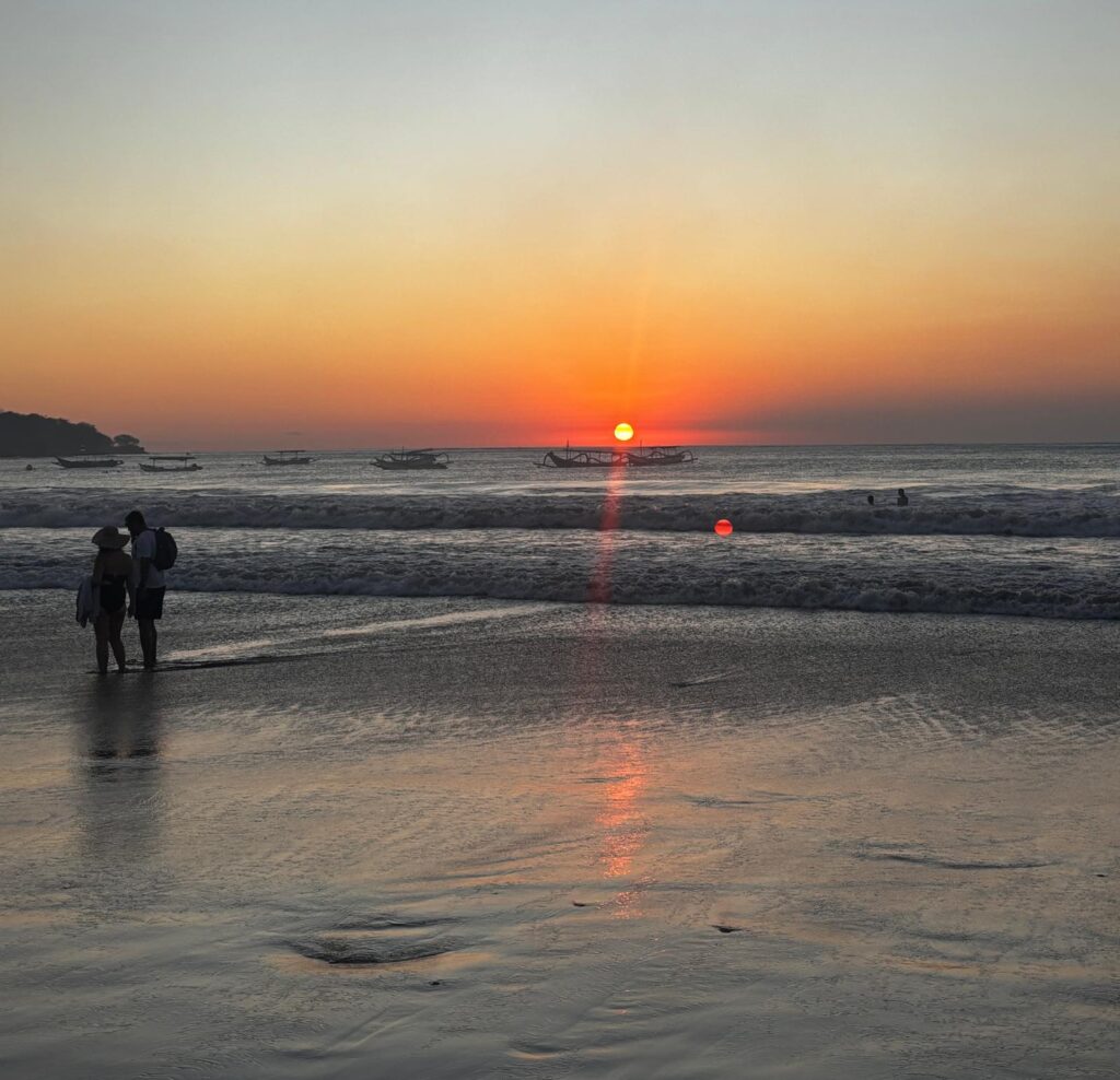 Jimbaran beach at sunset