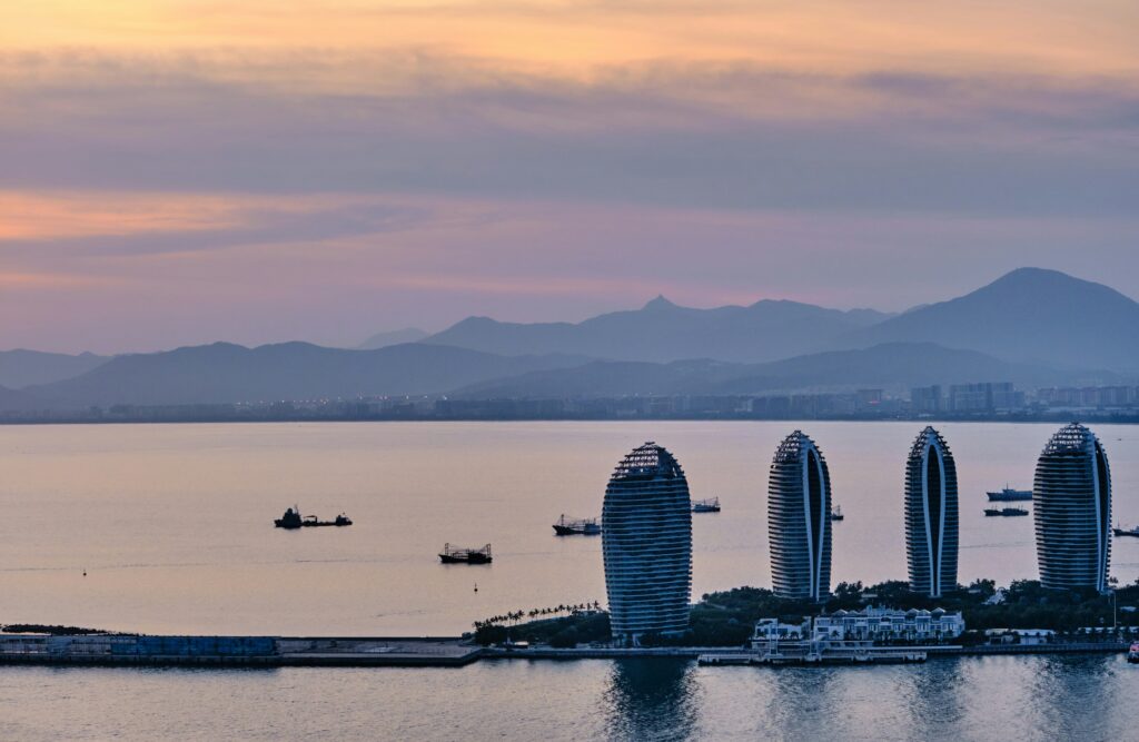 Sanya resorts along the water at sunset