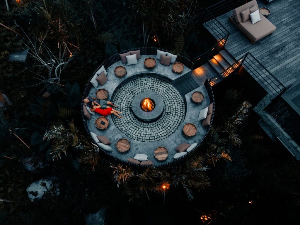 Munduk Cabins by Desa fireplace at night