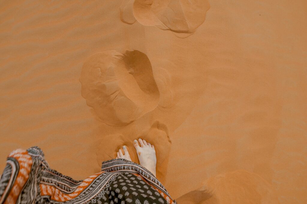footprint in Dubai desert sand
