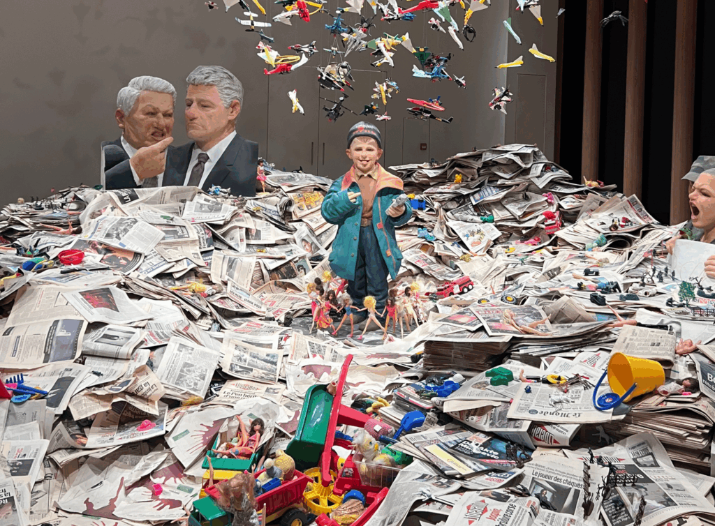 M+ museum boy with newspapers exhibit