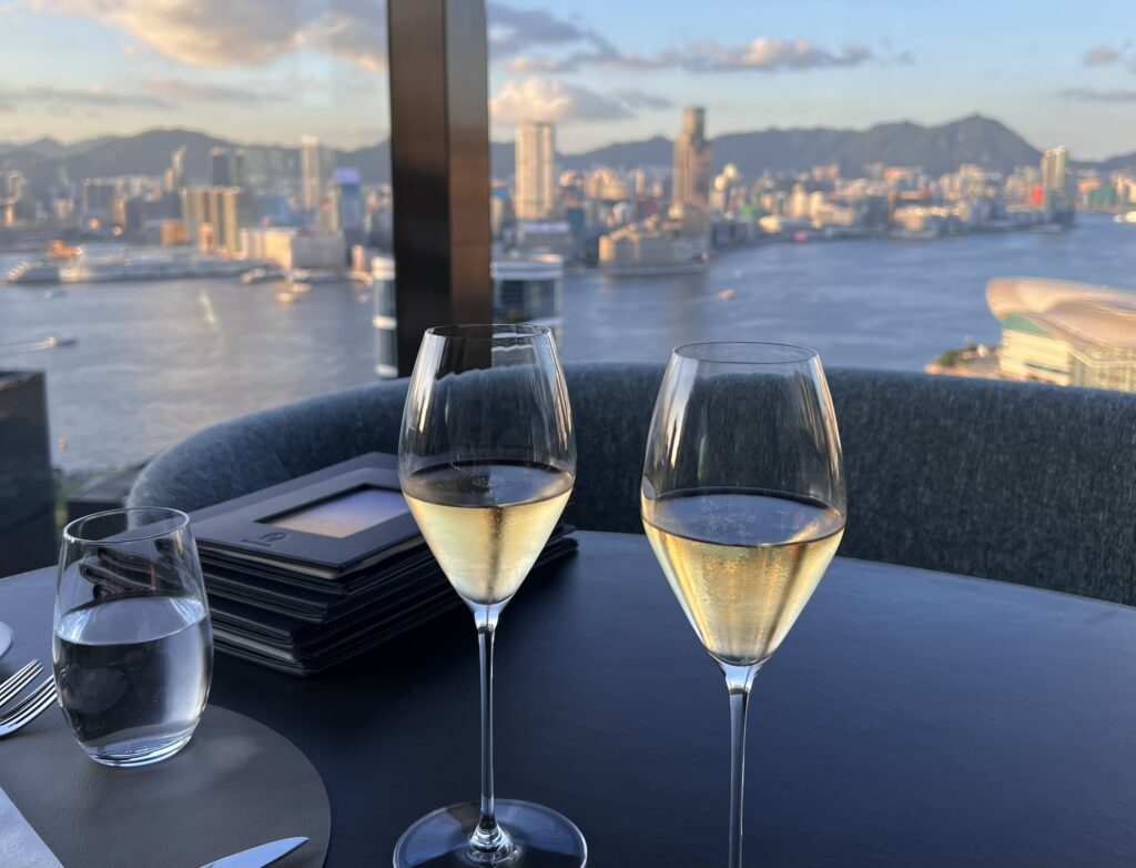 The Upper House Hong Kong wine glasses with. view of harbour