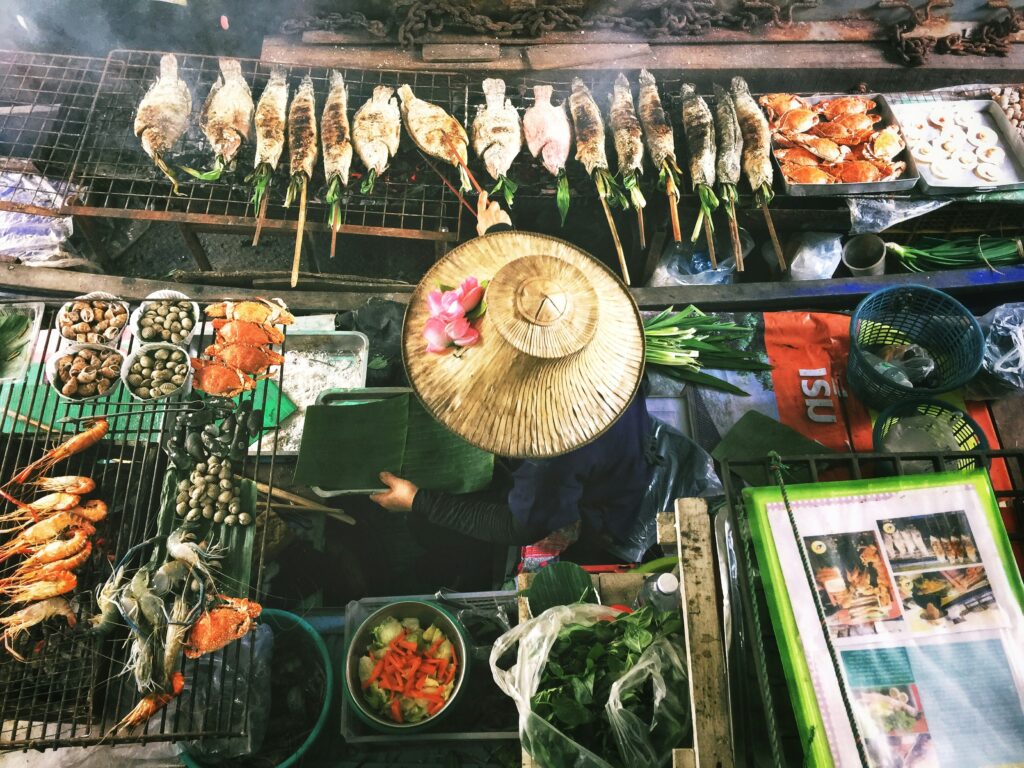 Bangkok water market vendor grilling