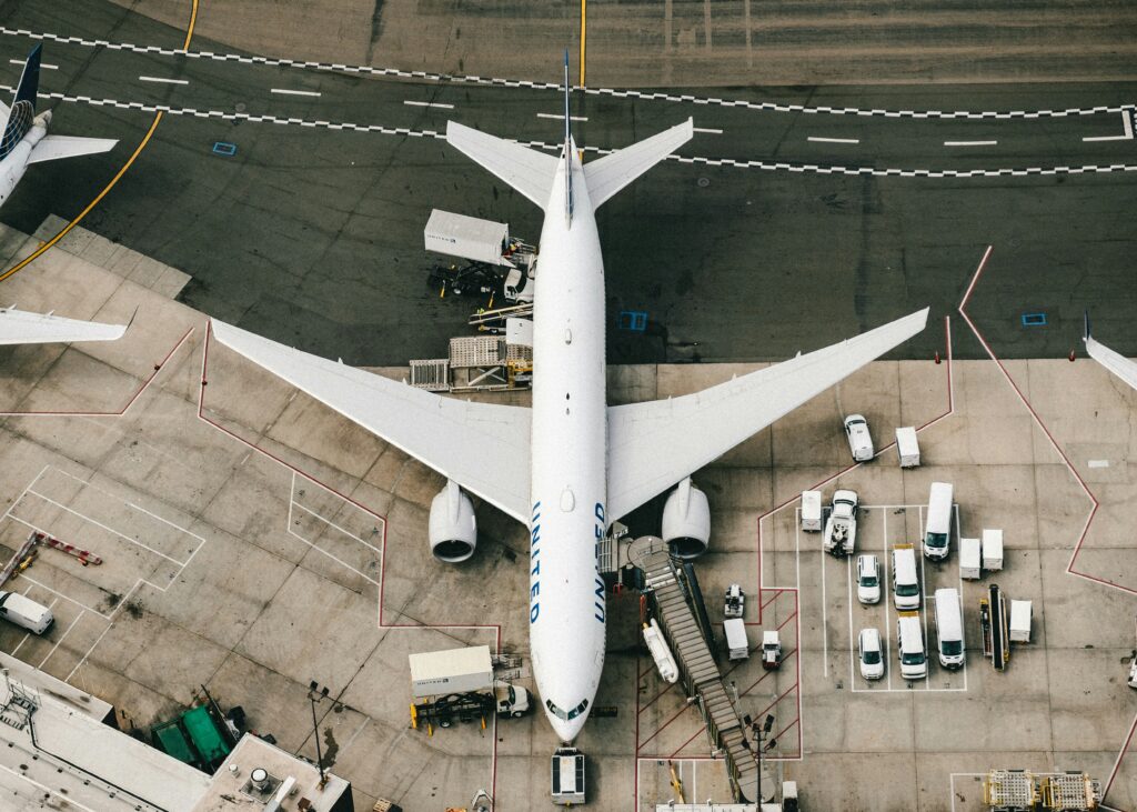 United Airlines plane docked at airport