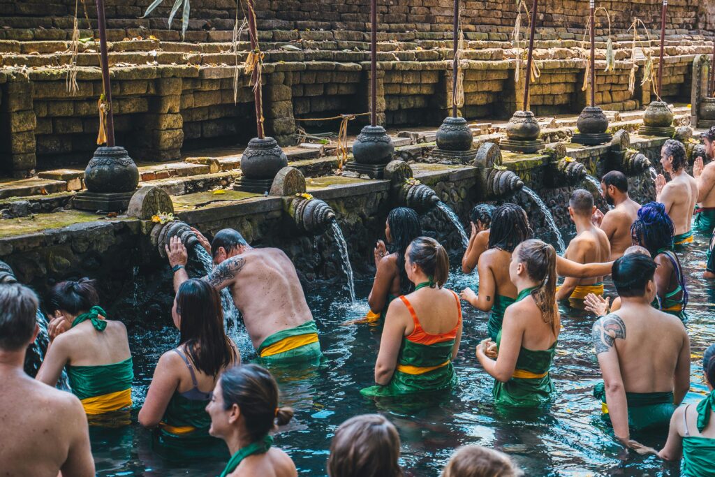 people cleansing themselves in Tirta Empul
